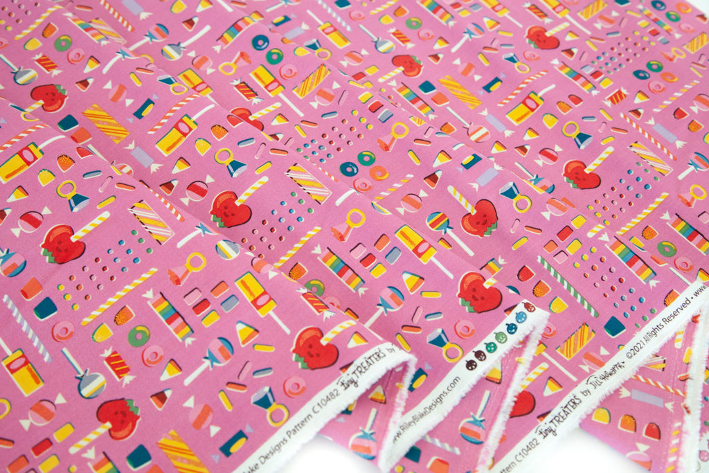 Retro Halloween candy on a pink fabric