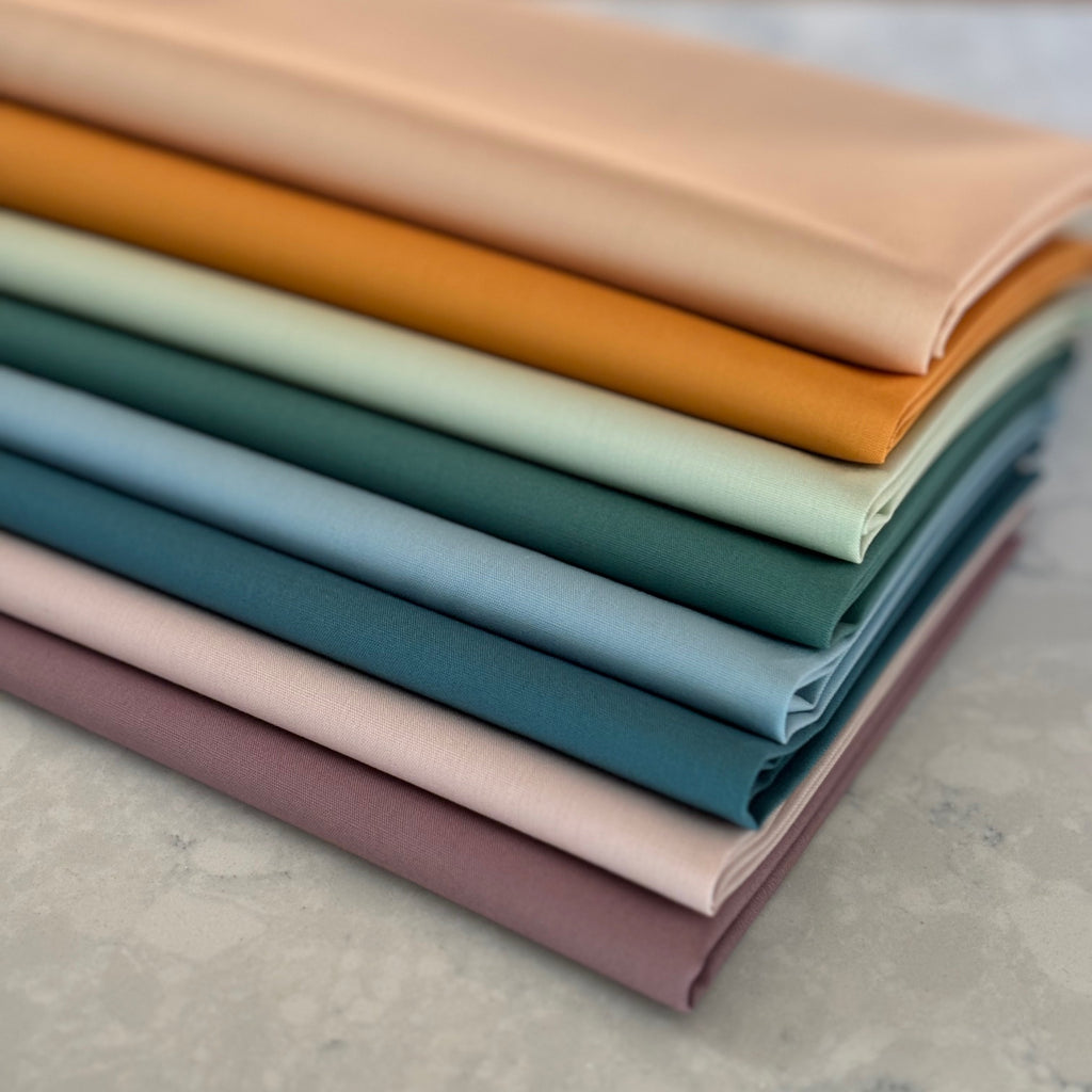 Curated fat quarter bundle of Signature PURE Solids from Art gallery Fabrics